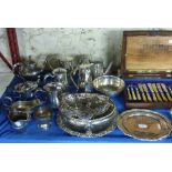 A quantity of silver-plate, some cased, including flatware, teapots, sauce boat, entree dishes,