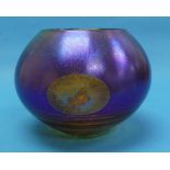 Siddy Langley; An art glass Bowl, with orange and purple colouring, creating a blue iridescence,