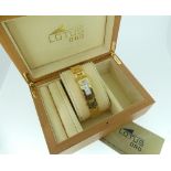 An Lotus Oro Saphir 18K gold lady's Wristwatch, with quartz movement, the rectangular dial with gilt