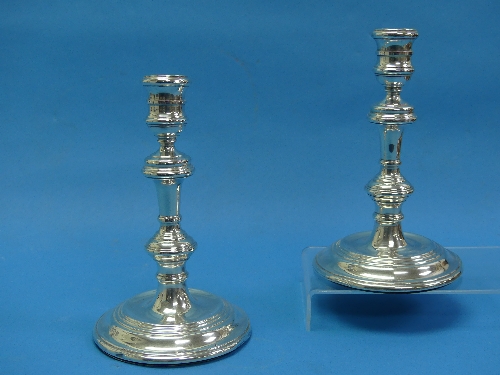 A pair of Elizabeth II silver Candlesticks, by Harrods Ltd (Richard Woodman Burbridge), hallmarked