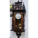 An early 20th century walnut Vienna Regulator style wall clock, of traditional form, the 8-day