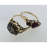 Two 9ct yellow gold Rings; one claw mounted with a circular facetted smoky quartz, the other with