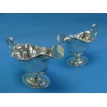 A pair of Edwardian silver Sauce Boats, by Josiah Williams & Co., hallmarked London, 1906, of