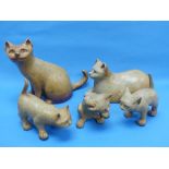 A Gil Tregunna studio pottery family or clowder of five Cats, comprising two adult cats, one seated,