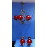 A wrought iron five-light Chandelier, the whole with scrolling and twisted wrought iron designs,