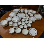 An extensive Aynsley 'April Rose' pattern Service, comprising fourteen Tea Cups with sixteen