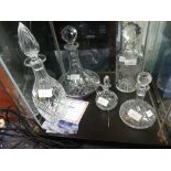 A collection of five Cut-glass Decanters, including a large Webb Corbett decanter, an Edinburgh
