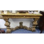 A 19thC continental carved giltwood and gesso Console Table, with faux-marble wooden top, the