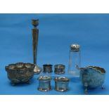 A quantity of Damaged / Scrap Silver, including capstan inkwell, four napkin rings, sauce boat,