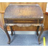 A 19thC continental burr walnut Ladies Desk, the fall front opening to reveal fitted interior raised