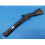 A 19thC Turkish flintlock 'knee' blunderbuss, decorated in the Balkan style with a chequered stock