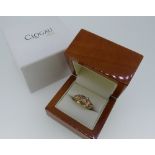 Clogau Gold; A 9ct yellow and rose gold 'Tree of Life' Ring, the pierced foliate rose gold front