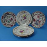 A set of four antique Chinese Famille Rose Dessert Plates, all patterned with a painted floral