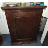 A 19thC oak two door Cupboard, the interior fitted with shelves, 27in wide x 14in deep x 35½in