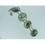 A graduated moss agate plaque Bracelet, the five agates all mounted in unmarked white metal with