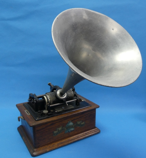 An Edison Bell Standard phonograph, Reg.No.6127, with oak case and aluminium horn, together with a