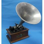 An Edison Bell Standard phonograph, Reg.No.6127, with oak case and aluminium horn, together with a