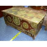 A 19th century Zanzibar brass bound hardwood Chest, with ornate studded and pierced strap work