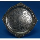 A late 19thC Anglo-Indian silver Tray, with engraved decoration of Indian Deities, the rim cast as