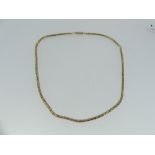 An unmarked yellow gold snakelink Necklace, with engraved barrel snap, unmarked but tested as not