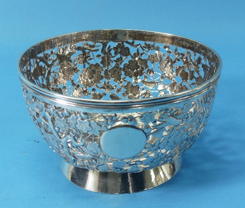 An Oriental circular silver bowl, pierced with birds amongst prunus, vacant cartouche, character - Image 5 of 9