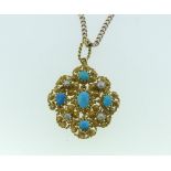 A gold filigree Pendant, set with turquoise and grey pearls, the reverse with brooch pin removed,