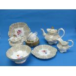 A Staffordshire porcelain 30-piece part-Tea Service, grey ground, painted in colours and gilt with