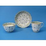 A Worcester Tea Trio, c. 1815, comprising a Tea Bowl, Tea Cup and Saucer, decorated with foliate