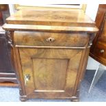 A 19thC continental flame mahogany side Cabinet, the quarter-veneered rectangular top above a single