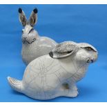 A Jennie Hale large raku fired studio pottery sculpture of a seated Hare, signed to base, 16in (40.