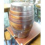 A 19thC stoneware Barrel, with bunged top and a fitted tap (16in (40cm) high x 12in (30cm) wide x