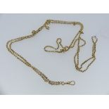 A 9ct yellow gold long circular link Chain, all unmarked but tested, with a 15ct suspension clip,