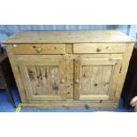 A 19thC pine Dresser Base, with two drawers above two doors, 53in (134cm) wide x 19½in deep (50cm) x