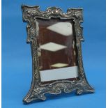 An Arts & Crafts silver Easel Frame, by Sydney & Co., hallmarked Birmingham, 1903, with stylised
