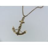 A 9ct hollow gold Pendant, in the form of a fouled anchor, marked on the suspension loop, on a 9k