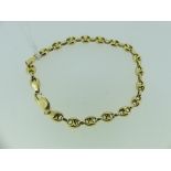 An 18ct yellow gold Bracelet, formed of figure of eight shaped links, approx total weight 9g.