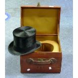 An early 20thC black silk Top Hat by Woodrow of Manchester, with manufacturer's stamp and