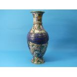 An early 20th century Japanese cloisonné Vase, of ovoid form and mould in relief with a tied ribbon,