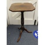 A Georgian mahogany tripod Table, the square top with canted angles on a ring-turned column and