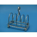 An Edwardian silver five bar Toast Rack, by Thomas Bradbury & Sons Ltd., hallmarked Sheffield, 1902,