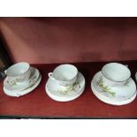A Crown Staffordshire six place setting Tea Service, the floral design on white base, enclosed