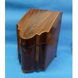 A George III mahogany Knife Box, of serpentine form, the whole finely inlaid with rosewood,