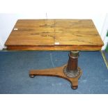 A 19thC, William IV rosewood Reading Table, comprising two hinged flaps which fold out to create