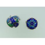 A small Art Nouveau silver and enamel Brooch, the centre depicting three shamrock on blue enamel