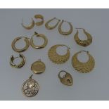 A quantity of 9ct gold, including earrings, small locket and padlock clasp, 16.4g, together with a