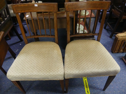 A pair of Edwardian mahogany Side Chairs, marked 'Oetzmann & Co' of Hampstead, London, with stick-