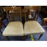 A pair of Edwardian mahogany Side Chairs, marked 'Oetzmann & Co' of Hampstead, London, with stick-