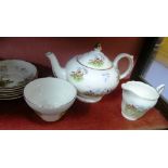 A 'Regency Bone China' six-place setting Tea Service, the pattern depicting hunting scenes,