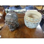 A continental earthenware Biscuit Barrel, in the form of a woman's head wearing a bonnet, with a lid