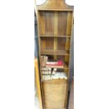 An Art Deco-style walnut Waterfall Bookcase, in a tall and thin shape, comprising three mobile